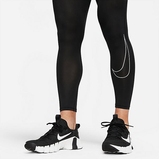 On Model 5 view of Men's Nike Pro Dri-FIT ADV Tights in Black/White Click to zoom