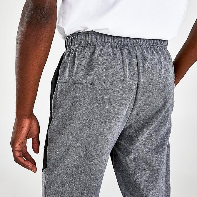 On Model 5 view of Men's Nike Therma-FIT Training Pants in Black/Heather/Black/White Click to zoom