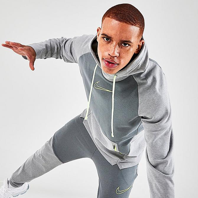 Front view of Men's Nike Therma-FIT Pullover Training Hoodie in Smoke Grey/Heather/Smoke Grey/Volt Click to zoom