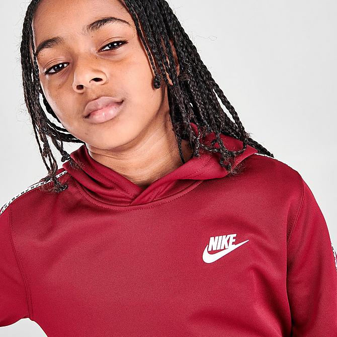 On Model 5 view of Kids' Nike Sportswear Repeat Tape Hoodie in Team Red/White Click to zoom