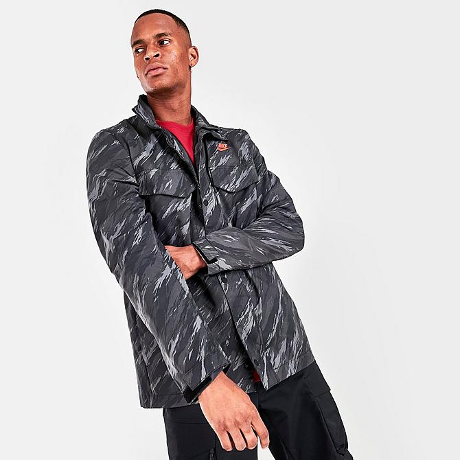 Back Left view of Men's Nike Sportswear Essentials+ Unlined M65 Allover Print Jacket in Black/Orange Click to zoom