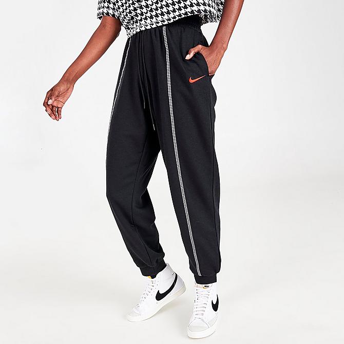 Front Three Quarter view of Women's Nike Sportswear Icon Clash Houndstooth Jogger Pants in Black/Chile Red Click to zoom
