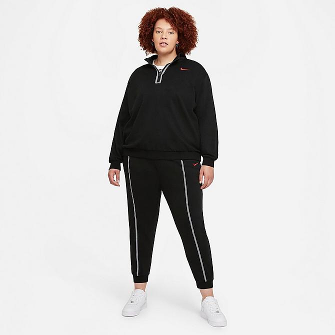 Front Three Quarter view of Women's Nike Sportswear Icon Clash Fleece Half-Zip Top in Black/Chile Red Click to zoom