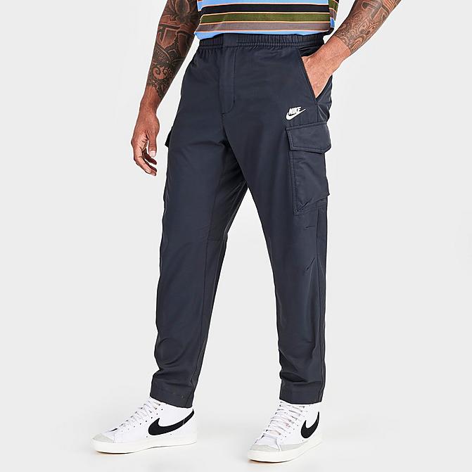 Front view of Men's Nike Sportswear Tech Essentials Unlined Cargo Commuter Pants in Black/White Click to zoom
