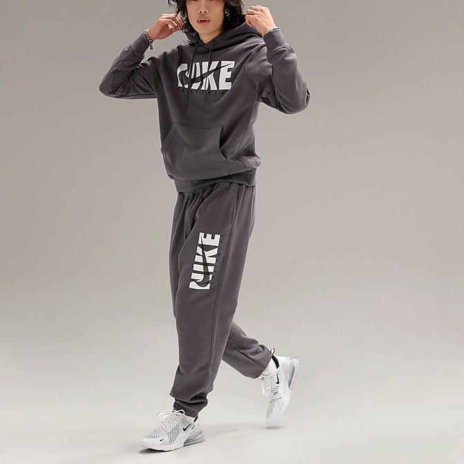 Front view of Men's Nike Sportswear Graphic Print Fleece Jogger Pants in Iron Grey/Iron Grey Click to zoom