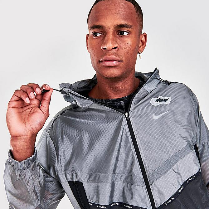 On Model 6 view of Men's Nike Repel Wild Run Graphic Windrunner Jacket in Smoke Grey Click to zoom