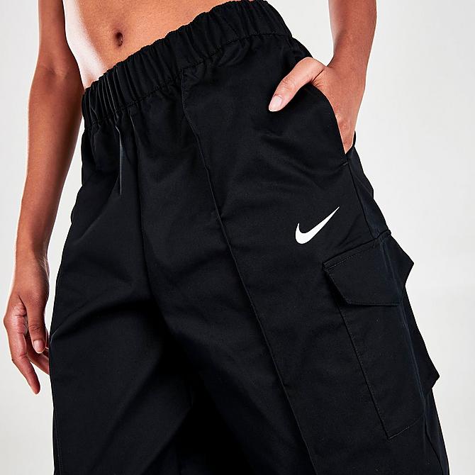 On Model 5 view of Women's Nike Sportswear Essentials Curve Woven High-Rise Cargo Pants in Black/White Click to zoom