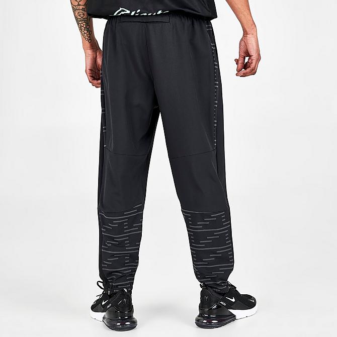 Back Left view of Men's Nike Dri-FIT Run Division Challenger Running Pants in Black/Reflective Silver Click to zoom