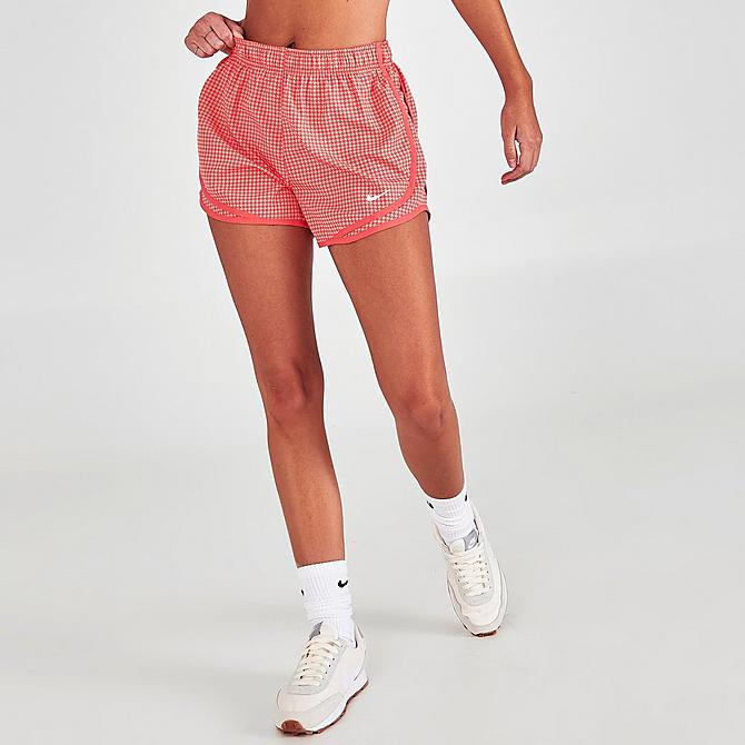 Front Three Quarter view of Women's Nike Dri-FIT Icon Clash Tempo Running Shorts in Magic Ember/Magic Ember/White Click to zoom