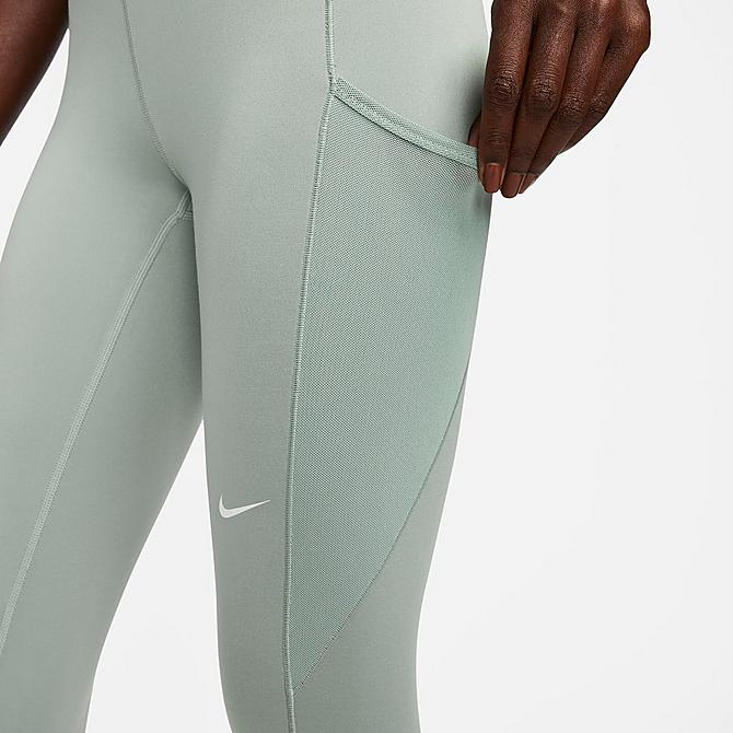 Back Right view of Women's Nike Pro Therma-FIT Mid-Rise Pocket Leggings in Jade Smoke/White Click to zoom