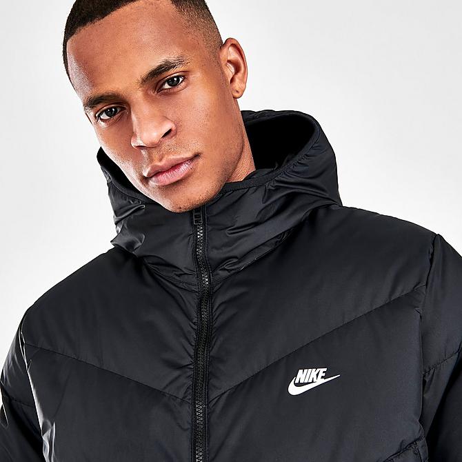 On Model 5 view of Men's Nike Sportswear Storm-FIT Windrunner Zip-Up Down Jacket in Black/Black/Black/Sail Click to zoom