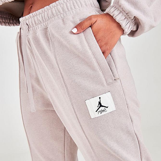 On Model 5 view of Women's Jordan Essentials Fleece Jogger Pants in Moon Particle/Heather/Thunder Grey Click to zoom