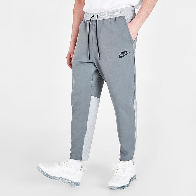 Front view of Men's Nike Sportswear Tech Essentials+ Winter Fleece Pants in Light Smoke Grey/Smoke Grey/Black/Black Click to zoom