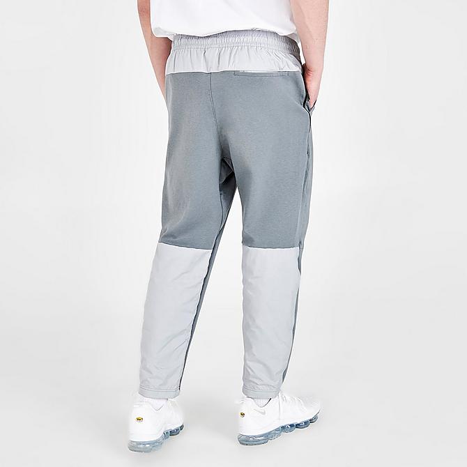 Back Right view of Men's Nike Sportswear Tech Essentials+ Winter Fleece Pants in Light Smoke Grey/Smoke Grey/Black/Black Click to zoom