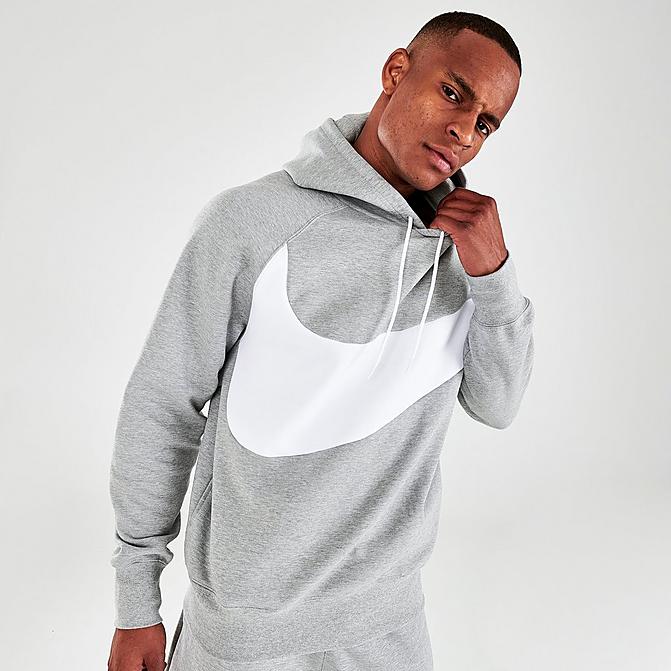 Front view of Men's Nike Sportswear Swoosh Logo Tech Fleece Pullover Hoodie in Dark Grey Heather/White/White Click to zoom