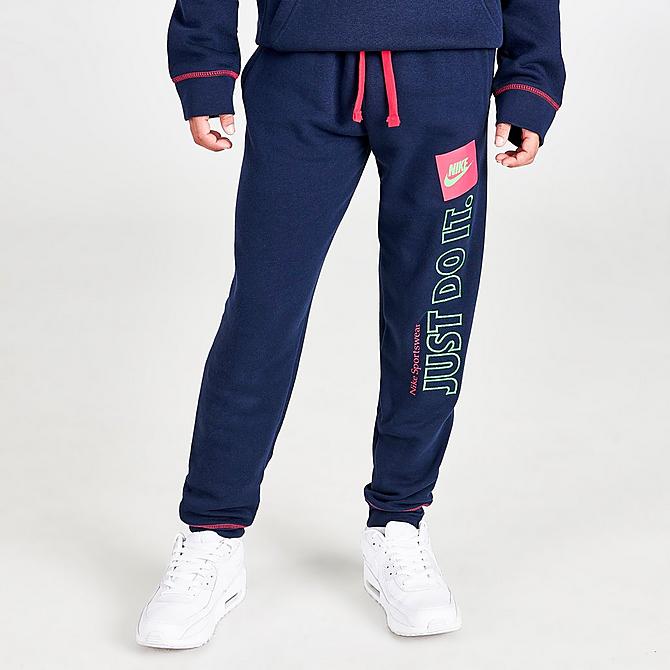 Front Three Quarter view of Boys' Nike Sportswear Just Do It Jogger Pants in Navy/Lime Click to zoom