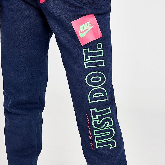 On Model 5 view of Boys' Nike Sportswear Just Do It Jogger Pants in Navy/Lime Click to zoom