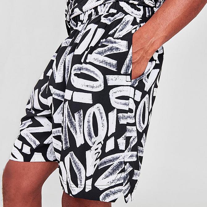 On Model 6 view of Men's Jordan Dri-FIT Zion Allover Print Woven Shorts in Black/Light Smoke Grey/White Click to zoom