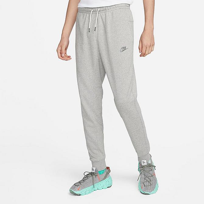 Front view of Men's Nike Sportswear Sport Essentials+ Jogger Pants in Multi/Grey Heather/Multi Click to zoom