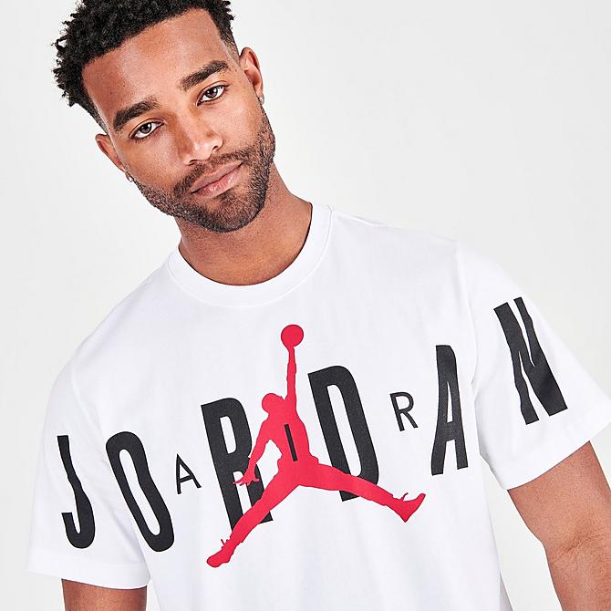 On Model 5 view of Men's Jordan Air Graphic Logo T-Shirt in White/Red Click to zoom