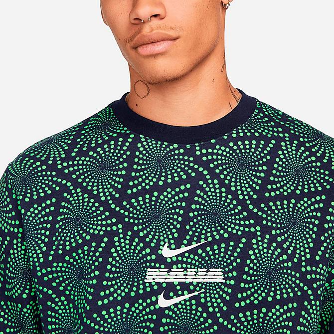 [angle] view of Men's Nike Sportswear Nigeria Club Fleece Crewneck Sweatshirt in Green Strike/Green Strike/White Click to zoom