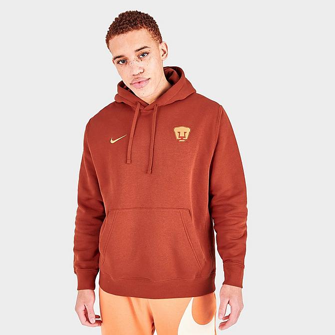 [angle] view of Men's Nike Pumas UNAM Club Fleece Pullover Hoodie in Firewood Orange Click to zoom