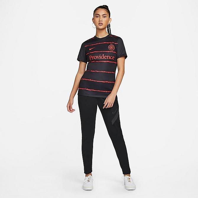 Back Left view of Women's Nike Portland Thorns FC 2022 Dri-FIT Stadium Home Soccer Jersey in Black/Challenge Red Click to zoom