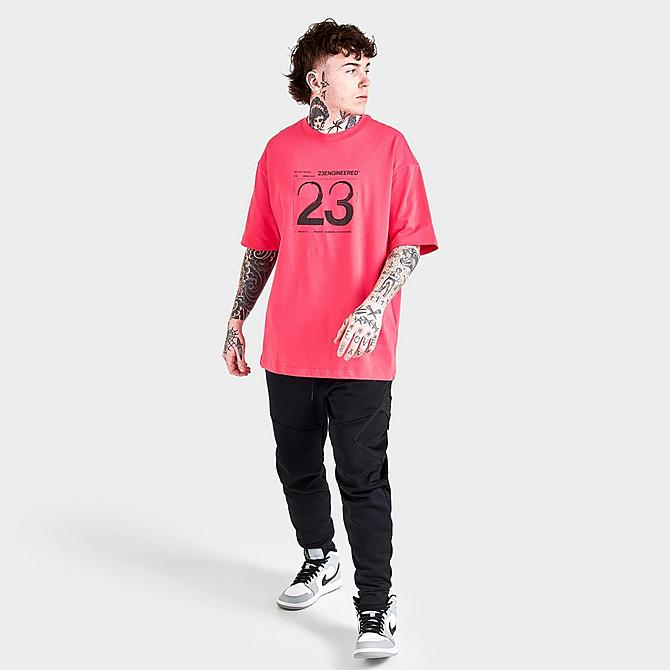Front Three Quarter view of Men's Jordan 23 Engineered Graphic Print Short-Sleeve T-Shirt in Light Fusion Red Click to zoom