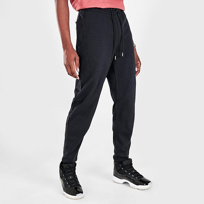 Back Left view of Men's Jordan Essentials Warmup Pants in Black/Gym Red Click to zoom
