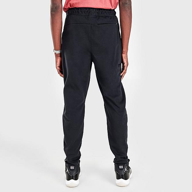 Back Right view of Men's Jordan Essentials Warmup Pants in Black/Gym Red Click to zoom