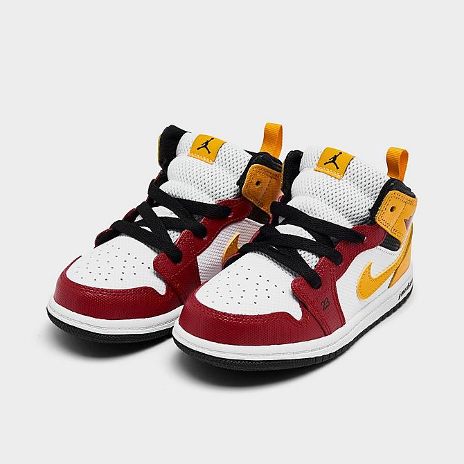 Three Quarter view of Kids' Toddler Air Jordan 1 Mid SE Casual Shoes in Black/University Gold/Gym Red/White Click to zoom