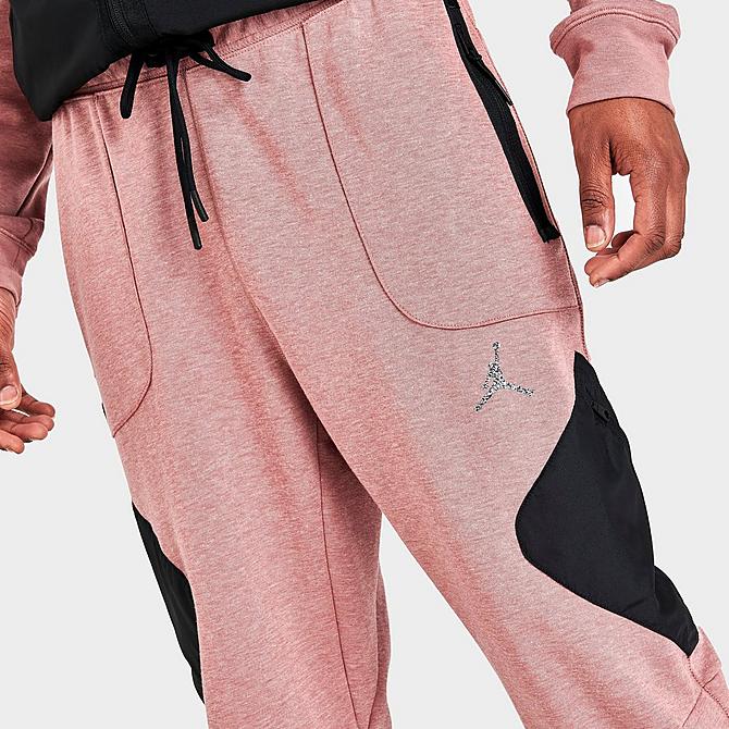 On Model 5 view of Men's Jordan Dri-FIT Air Fleece Pants in Fossil Rose/Black/Reflective Silver Click to zoom