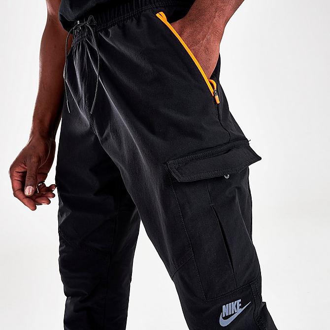 On Model 5 view of Men's Nike Sportswear Air Max Woven Cargo Jogger Pants in Black/Black/Black Click to zoom