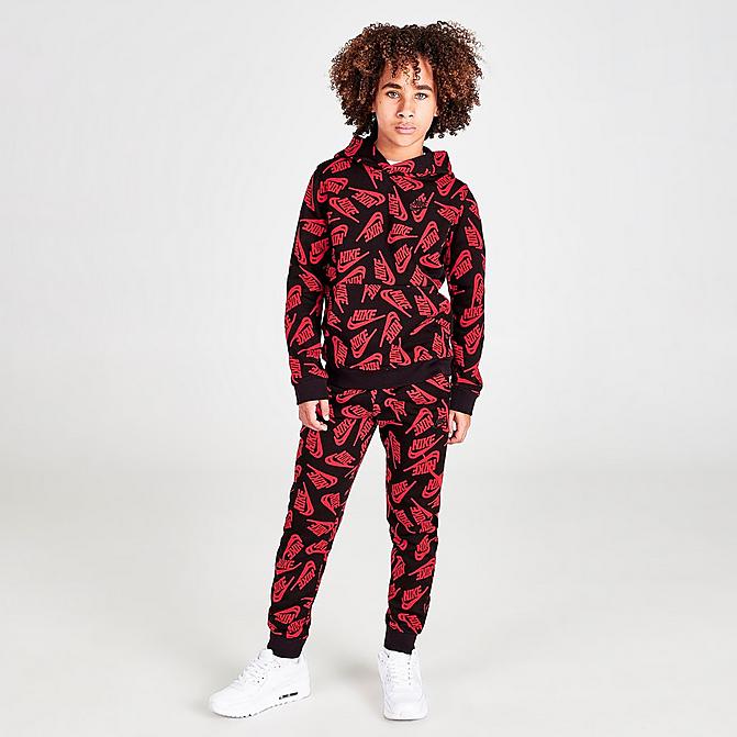Front view of Kids' Nike Sportswear Allover Logo Jogger Pants in University Red/Black Click to zoom