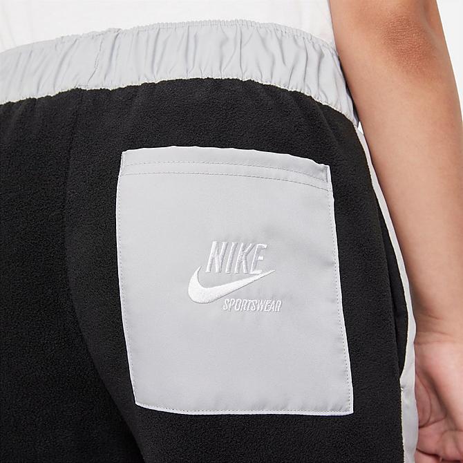 On Model 6 view of Girls' Nike Sportswear Heritage Jogger Pants in Black/Light Smoke Grey/White Click to zoom