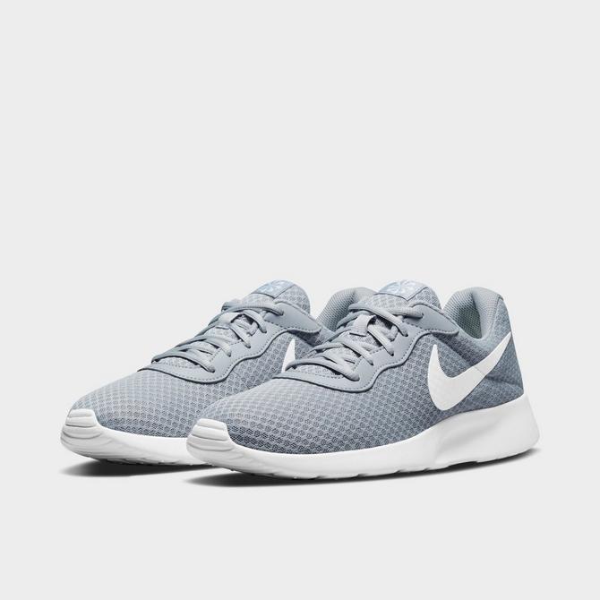 Finish line hot sale nike tanjun