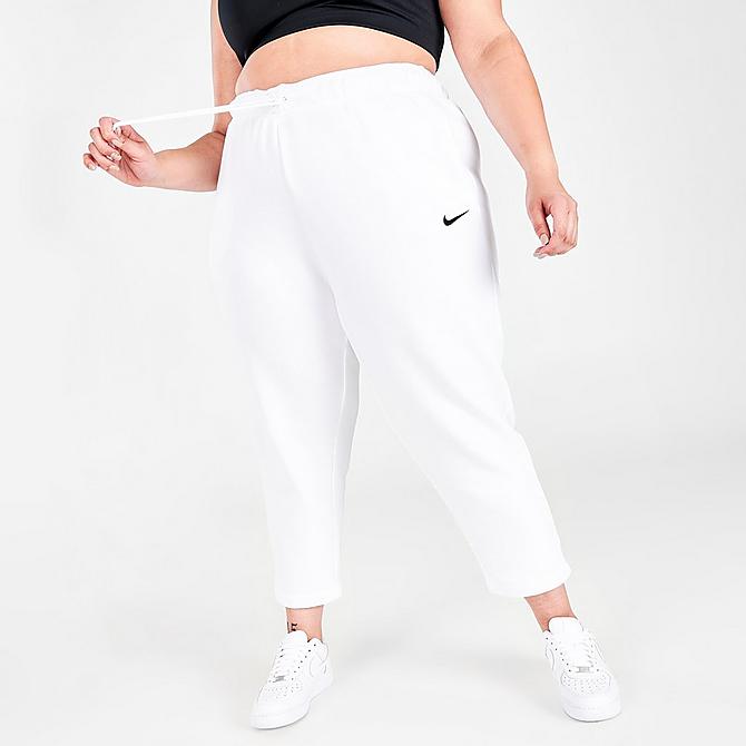 Front Three Quarter view of Women's Nike Sportswear Collection Essentials Fleece Pants (Plus Size) in White/Black Click to zoom
