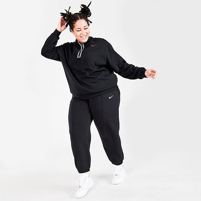 Front Three Quarter view of Women's Nike Sportswear Icon Clash Quarter-Zip Top (Plus Size) in Black/Chile Red Click to zoom