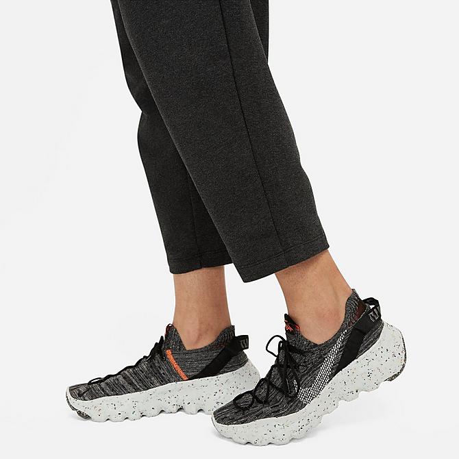 On Model 6 view of Women's Nike Sportswear Collection Essentials Curve Recycled French Terry Jogger Pants in Black Heather/White Click to zoom