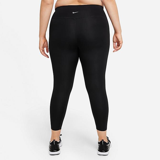 Back Left view of Women's Nike Dri-FIT Swoosh Run Mid-Rise Cropped Running Leggings (Plus Size) in Black/White Click to zoom