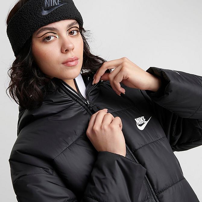 On Model 5 view of Women's Nike Sportswear Therma-FIT Repel Hooded Classic Puffer Jacket in Black/Black/White Click to zoom