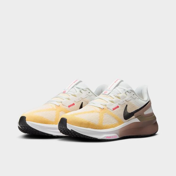 Three Quarter view of Women's Nike Air Zoom Structure 25 Running Shoes in Summit White/Black/Mink Brown/Varsity Maize Click to zoom