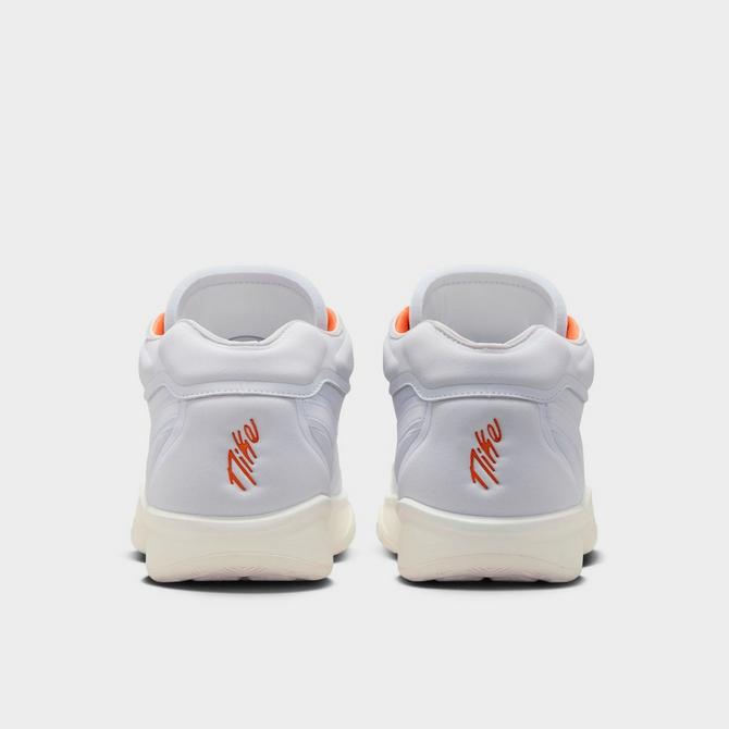 Left view of Nike G.T. Hustle 2 Basketball Shoes in White/Sail/Safety Orange/White Click to zoom