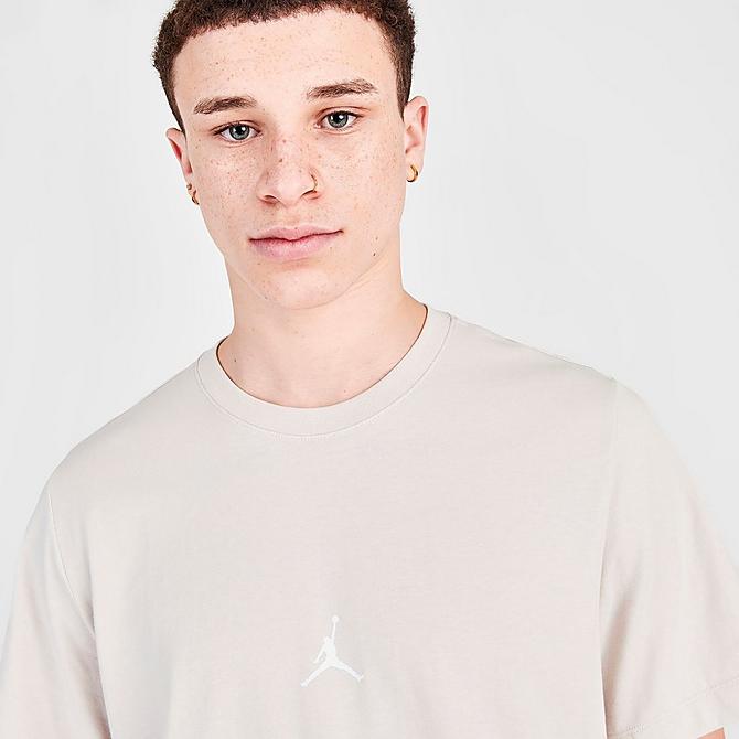 On Model 6 view of Men's Jordan Essentials Flight 23 Graphic Print Short-Sleeve T-Shirt in Light Orewood Brown/White Click to zoom