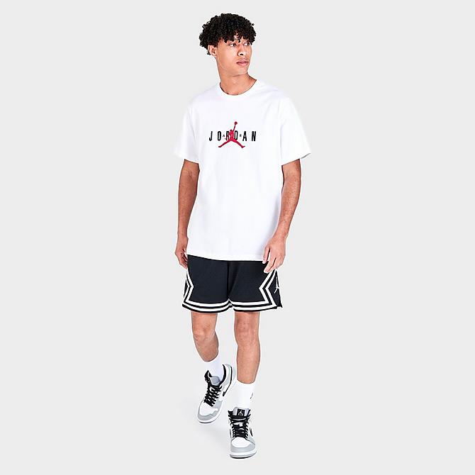 Front Three Quarter view of Men's Jordan Air Graphic Print Short-Sleeve T-Shirt in White/Black/Gym Red Click to zoom