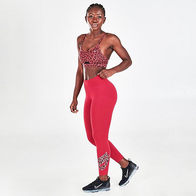 Front view of Women's Nike Sportswear Mid-Rise Animal Print Futura Leggings in Pomegranate Click to zoom