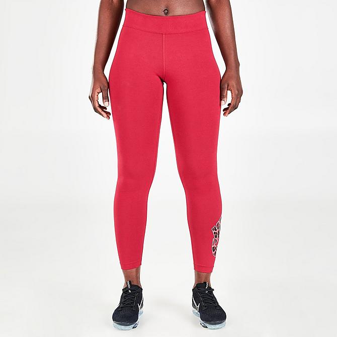 Front Three Quarter view of Women's Nike Sportswear Mid-Rise Animal Print Futura Leggings in Pomegranate Click to zoom