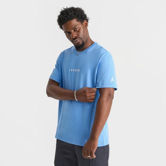 [angle] view of Men's Jordan Embroidered Air Graphic T-Shirt in Legend Blue/White Click to zoom