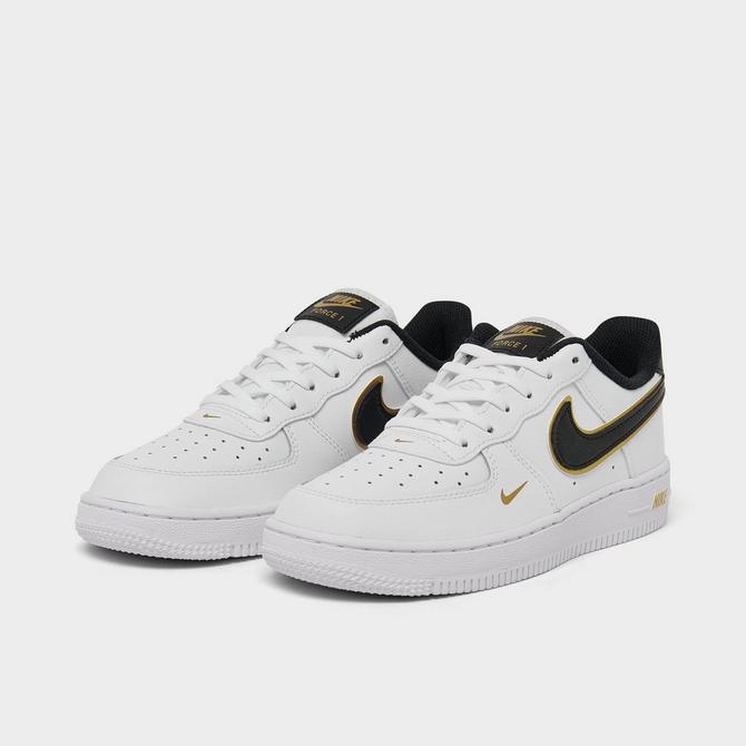 boys black and gold nikes