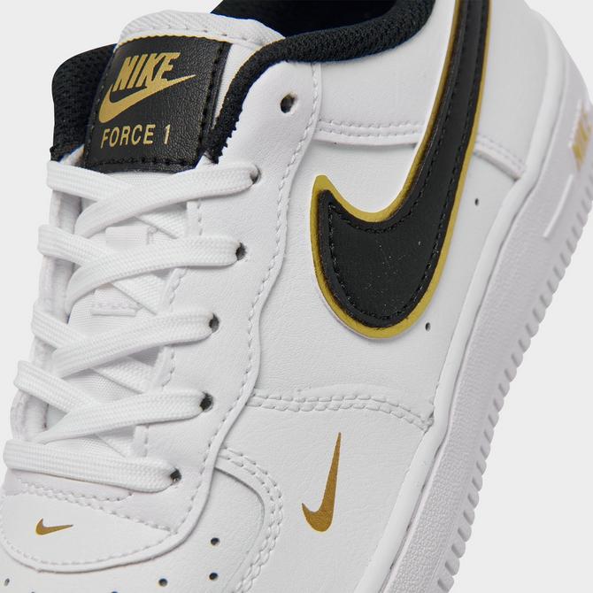 boys black and gold nikes